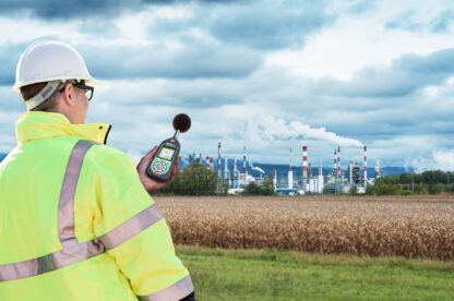 Man demonstrating using the sonik for environmental noise measurment